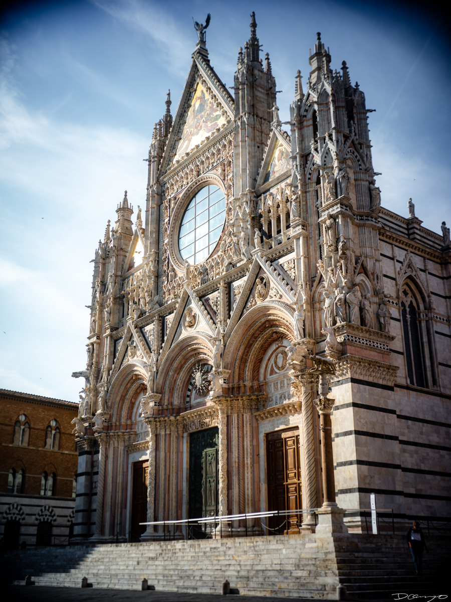 Photos from a trip through Italy in Summer of 2023. Locations include Rome, Florence, Tuscany, Castello di Bossi in Chianti, Siena, San Gimignano, Sirmione on Lake Garda, Bologna, Gudon, Italian Dolomites, Seceda, Cadini di Misurina, and Venice.